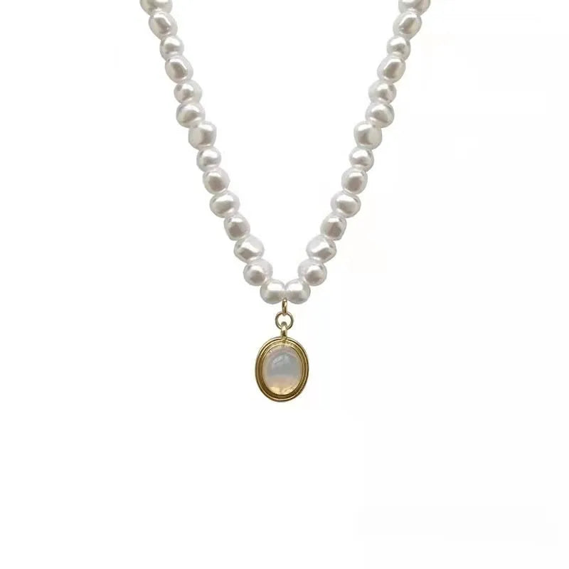 French Court vintage geometry pearl necklace with adjustable perimeter on display