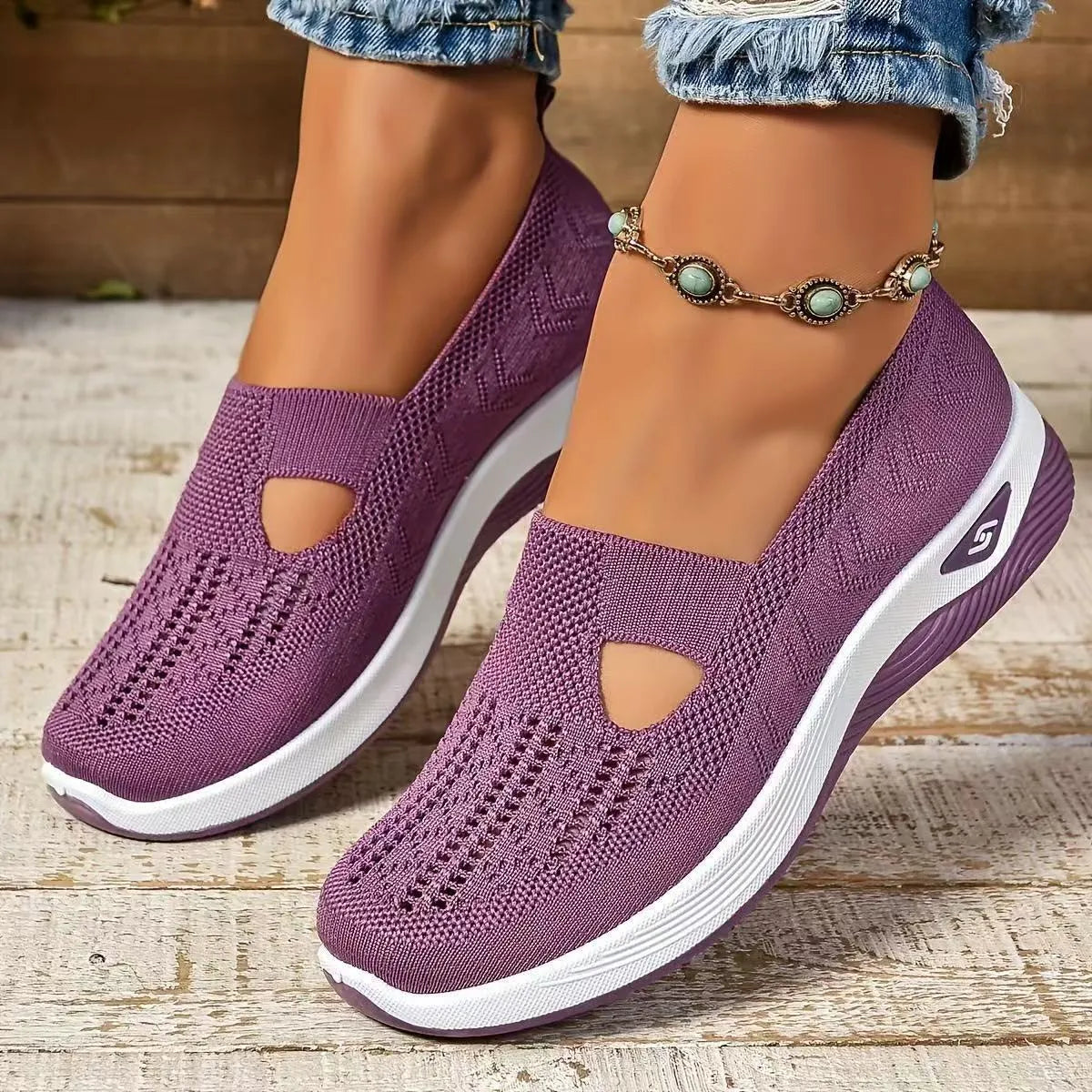 Women's casual mesh flat shoes with a T-bar strap and round toe in multiple colours.