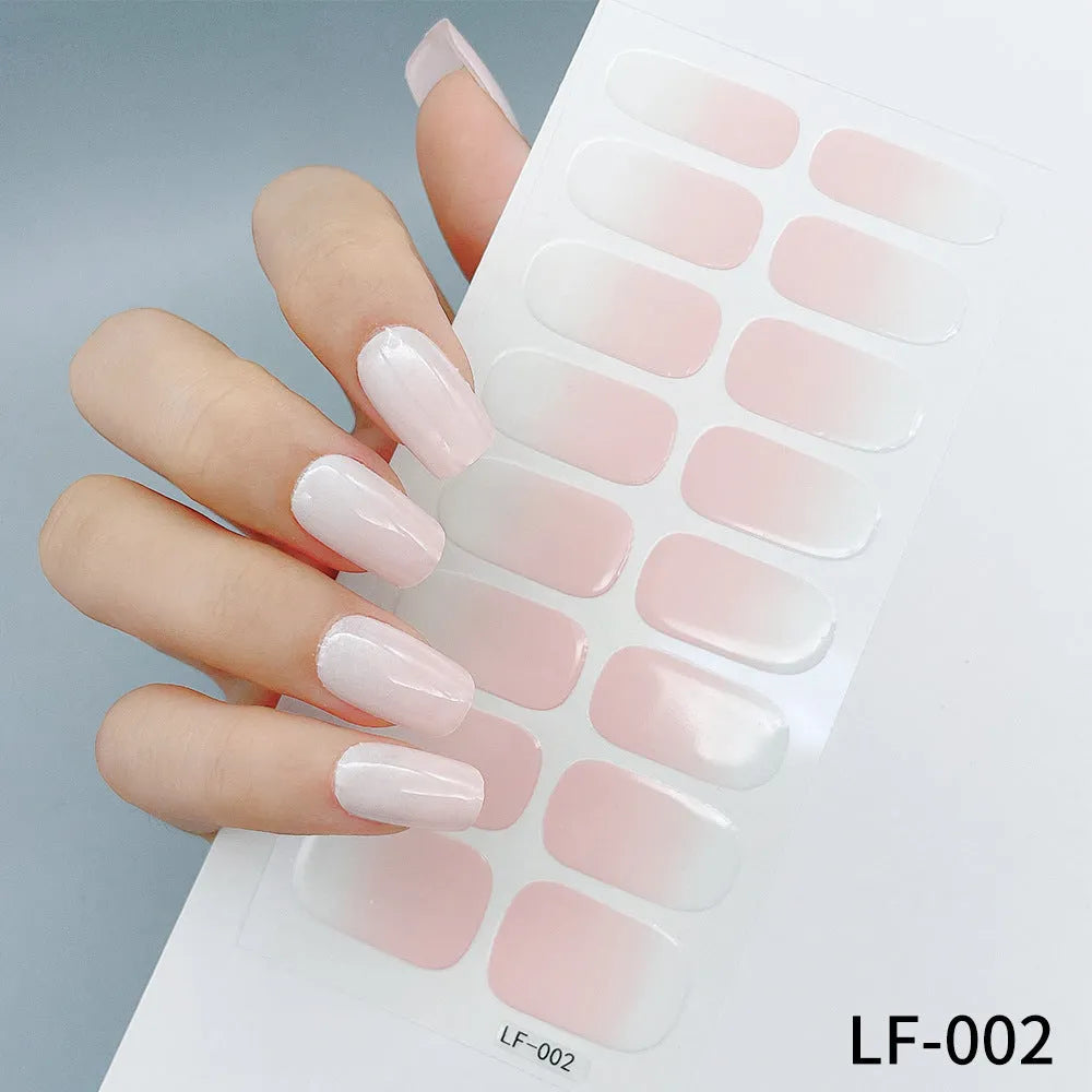 Full nail art sticker sheet showing 16 different solid colour designs including European simple nails and floral patterns