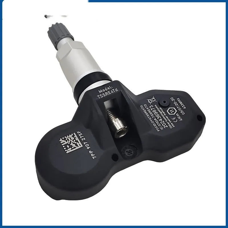 Black Audi tyre pressure monitoring sensor unit for vehicle wheel installation