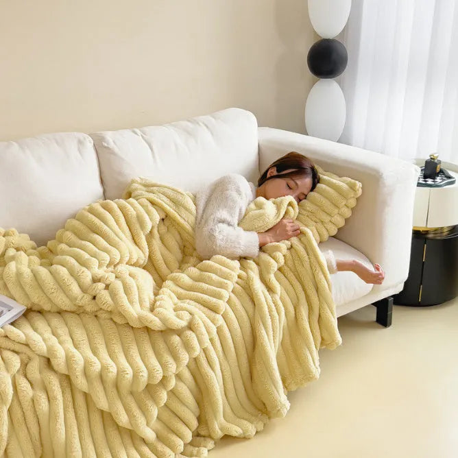 Solid colour bubble faux rabbit fur double-sided thickening blanket shown in a khaki colour
