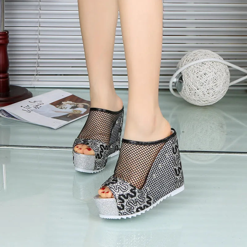 Women's black Korean-style platform sandals with hollowed-out heel, chunky block heel, and lace-up front on mesh upper.