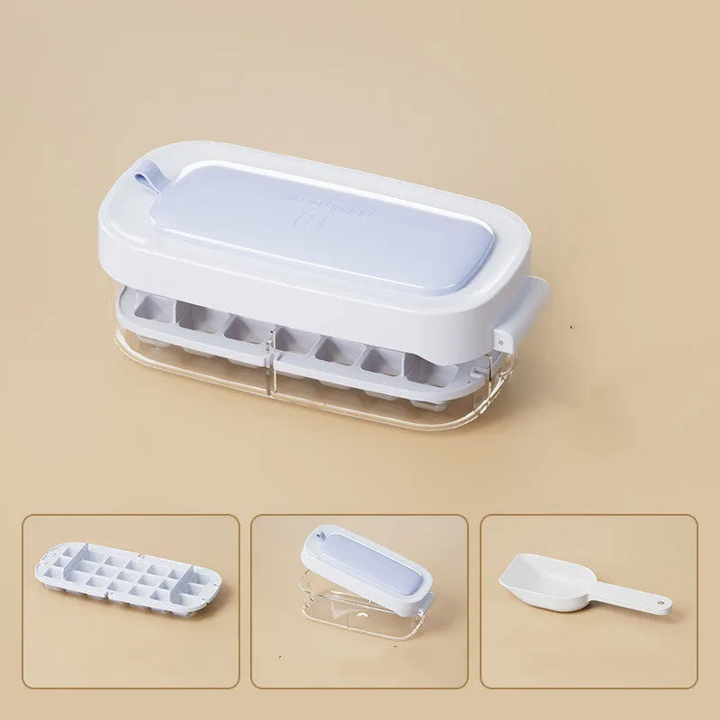 Colourful ice cube tray with grid design and integrated ice shovel storage compartment