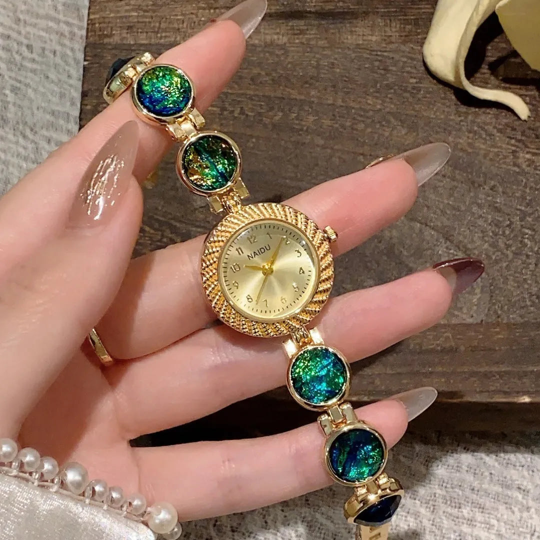 Women's quartz watch with 25mm round dial and zinc alloy case in a choice of six colours.