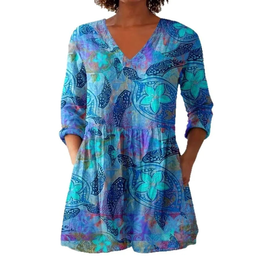 Woman wearing a retro slim fit, digitally printed long-sleeved top in a floral design.