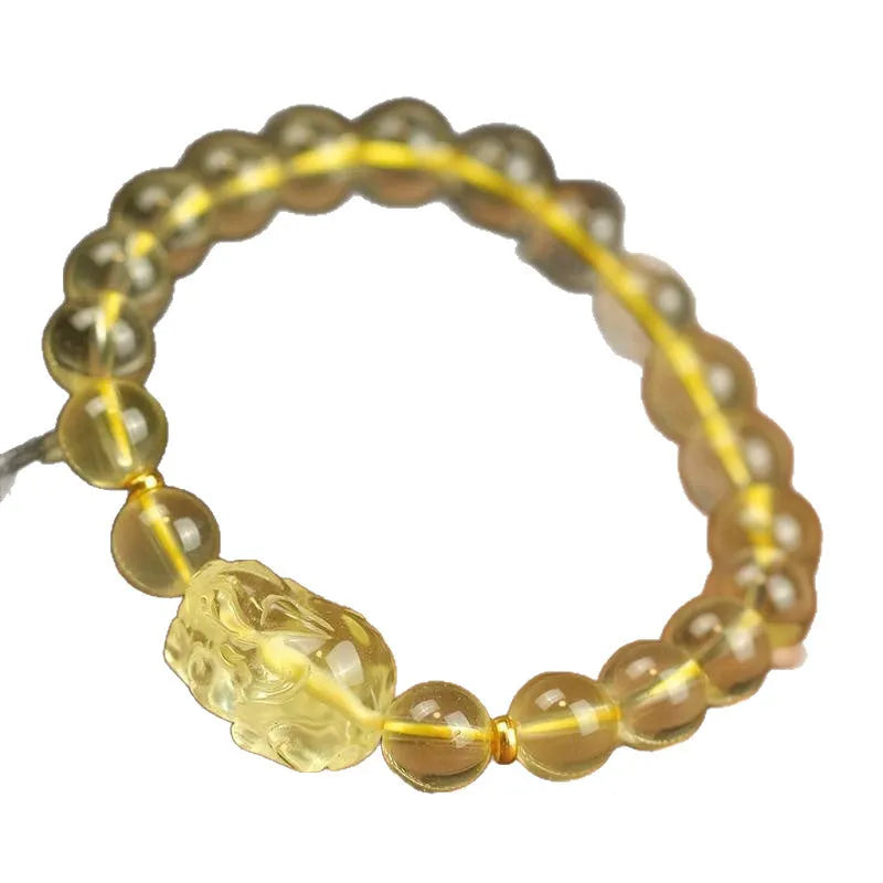 Yellow Chinese pi xiu bracelet with artificial crystal beads on leather cord