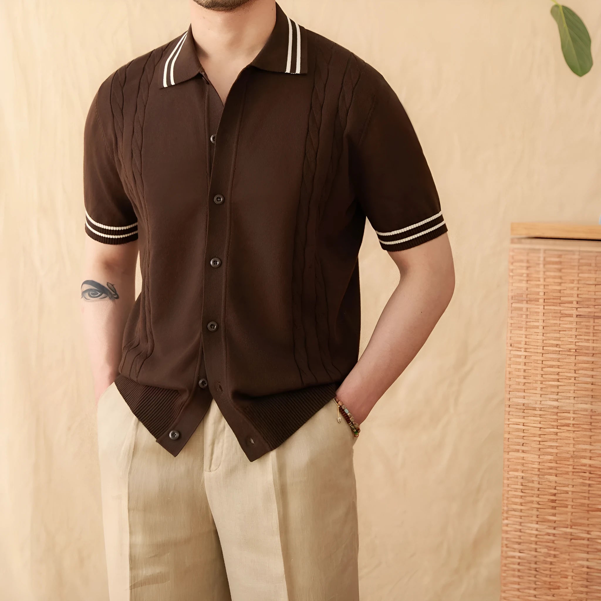 Men's apricot lapel polo shirt with short sleeves made from cotton polyester blend fabric.