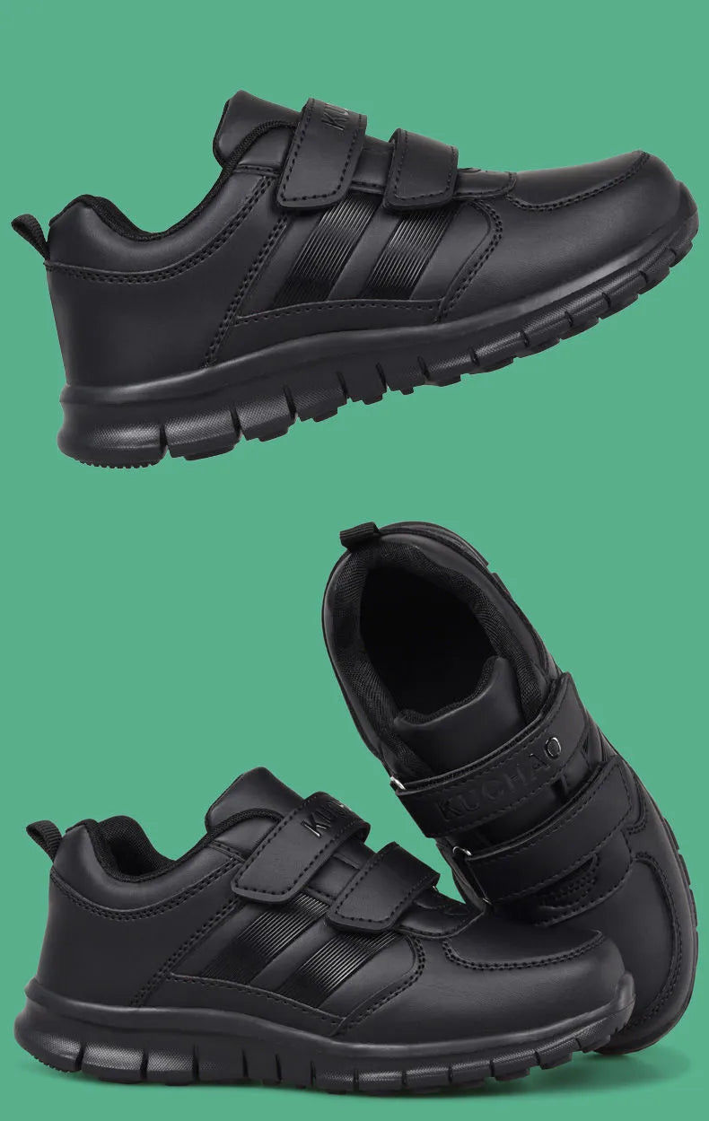 Boys' black waterproof sports shoes with mesh upper and round toe design on light background