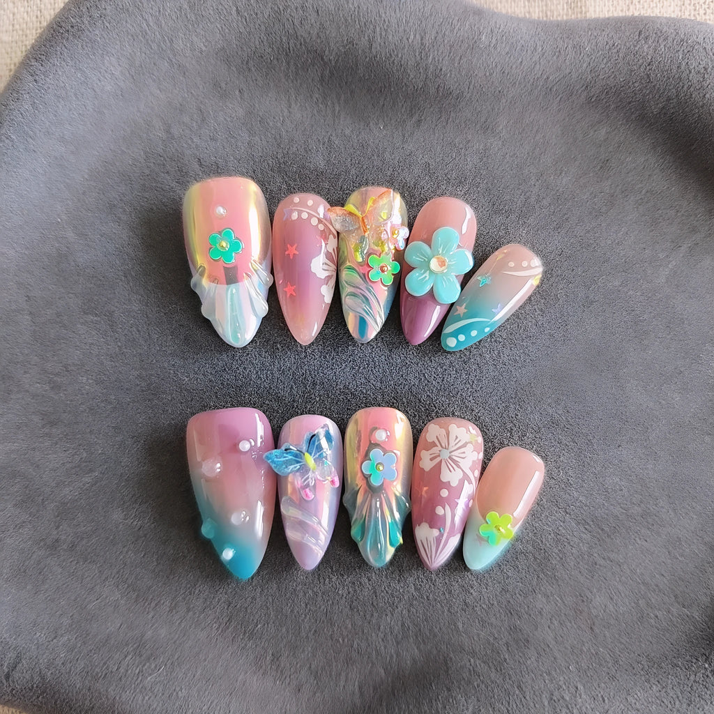Handmade nail art sculptures with flower and butterfly designs for manicure decoration