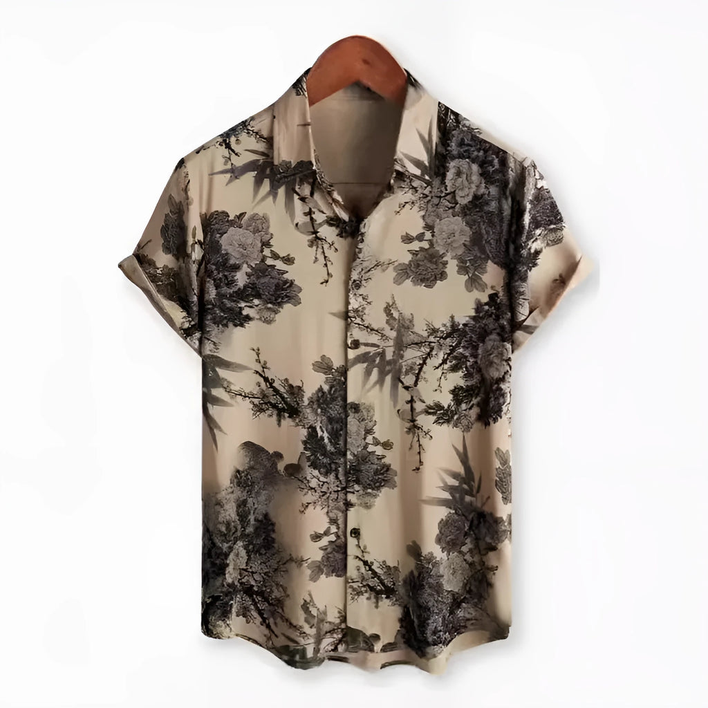 Man wearing a short sleeve Hawaiian print shirt with a floral lapel, made from elastic polyester fabric.