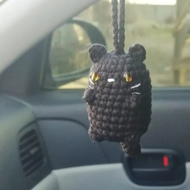 Plush hand-woven car hanging ornament in a cartoon design made from polyester