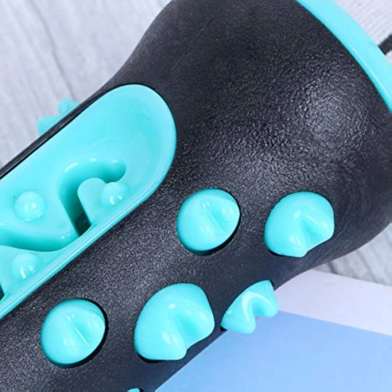 Natural rubber dog toothbrush chew toy in blue colour for dental cleaning, showing textured stick design