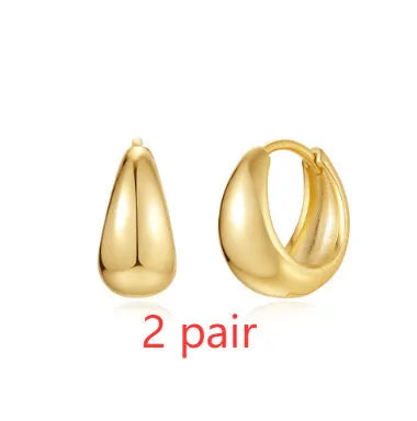 Gold electroplated brass earclip earrings with geometric round design in three style options