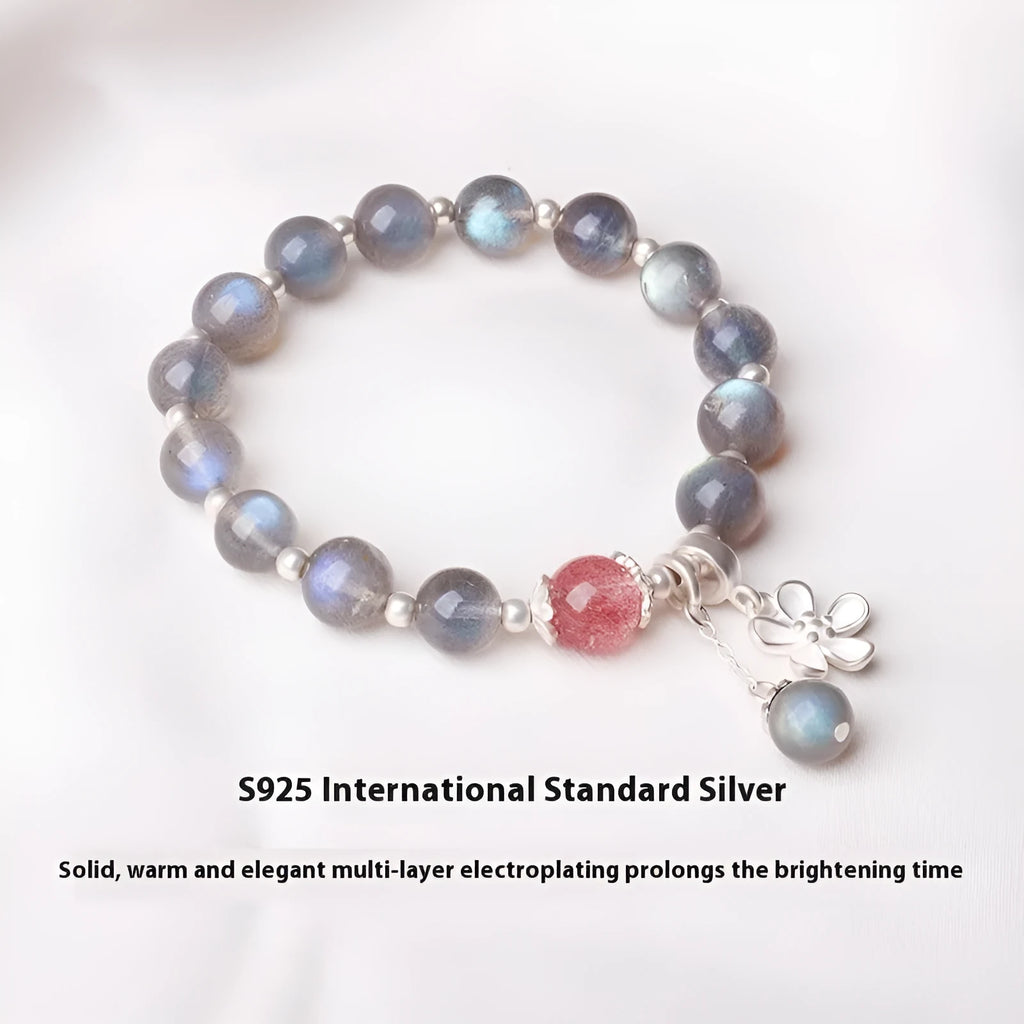 Women's 925 silver bracelet with grey moonlight stones and a honeysuckle animal charm.