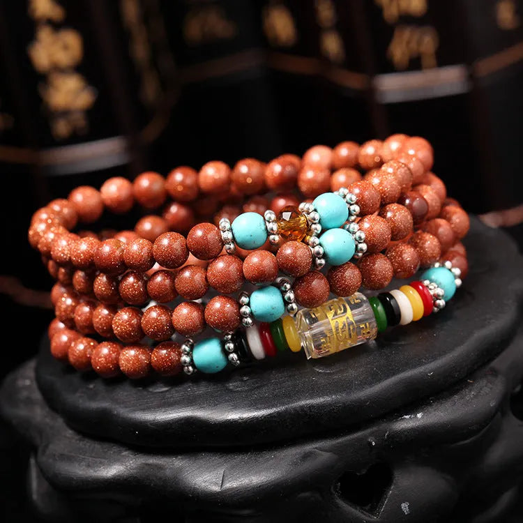 Golden star stone mantra bracelet with 108 nugget sand beads and retro fu character design