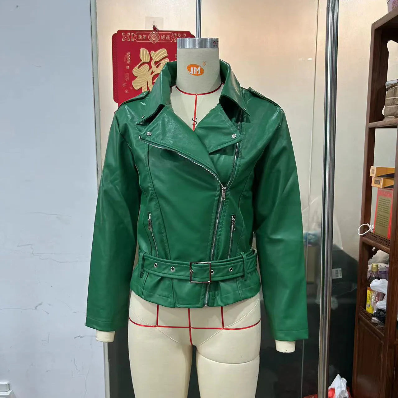 A black punk-style men's jacket with a locomotive shape, Peter Pan collar, and a drawstring waist.