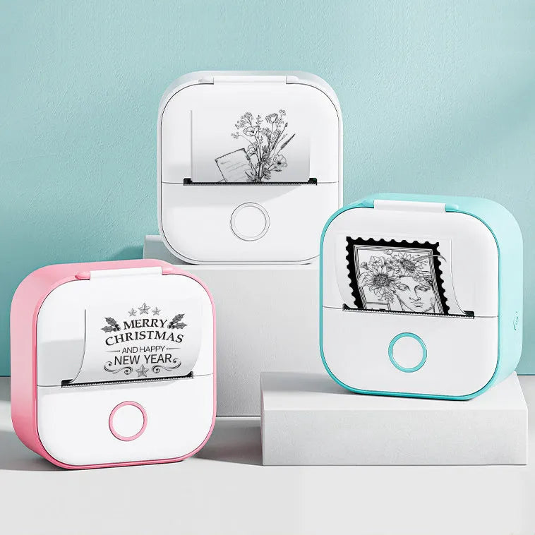 Phomemo T02 mini thermal label printer in white, showing front view with roll of sticky paper