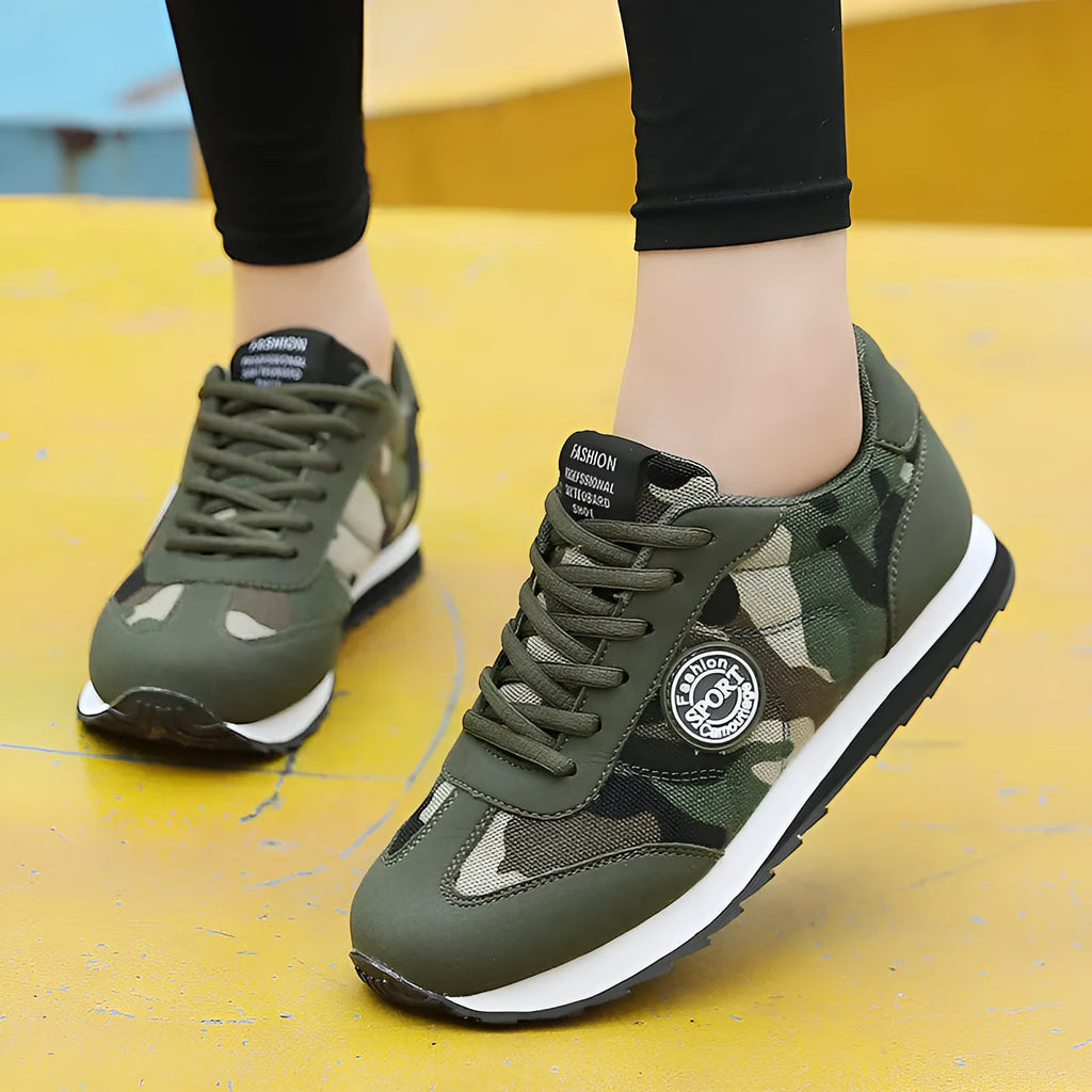Camouflage pattern suede sports shoes with mesh lining and a flat foam sole.