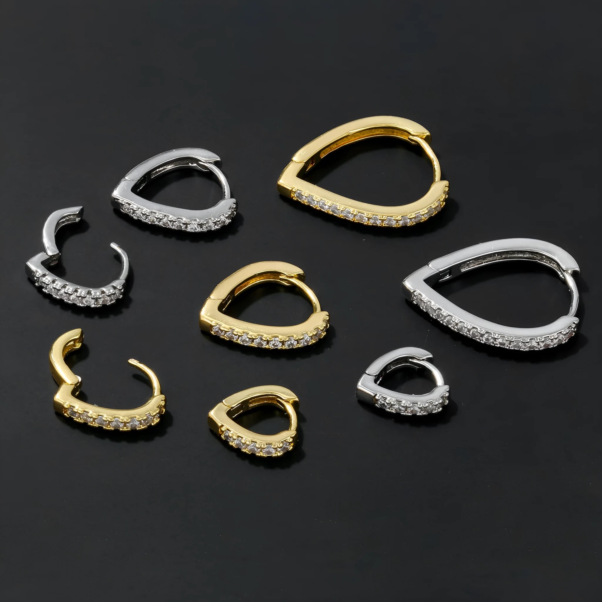 Geometric heart-shaped women's ear clip with electroplated gold finish on copper base material