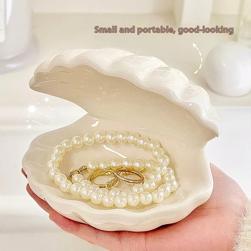 White porcelain ornament board with integrated small night lamp and storage tray for jewellery.