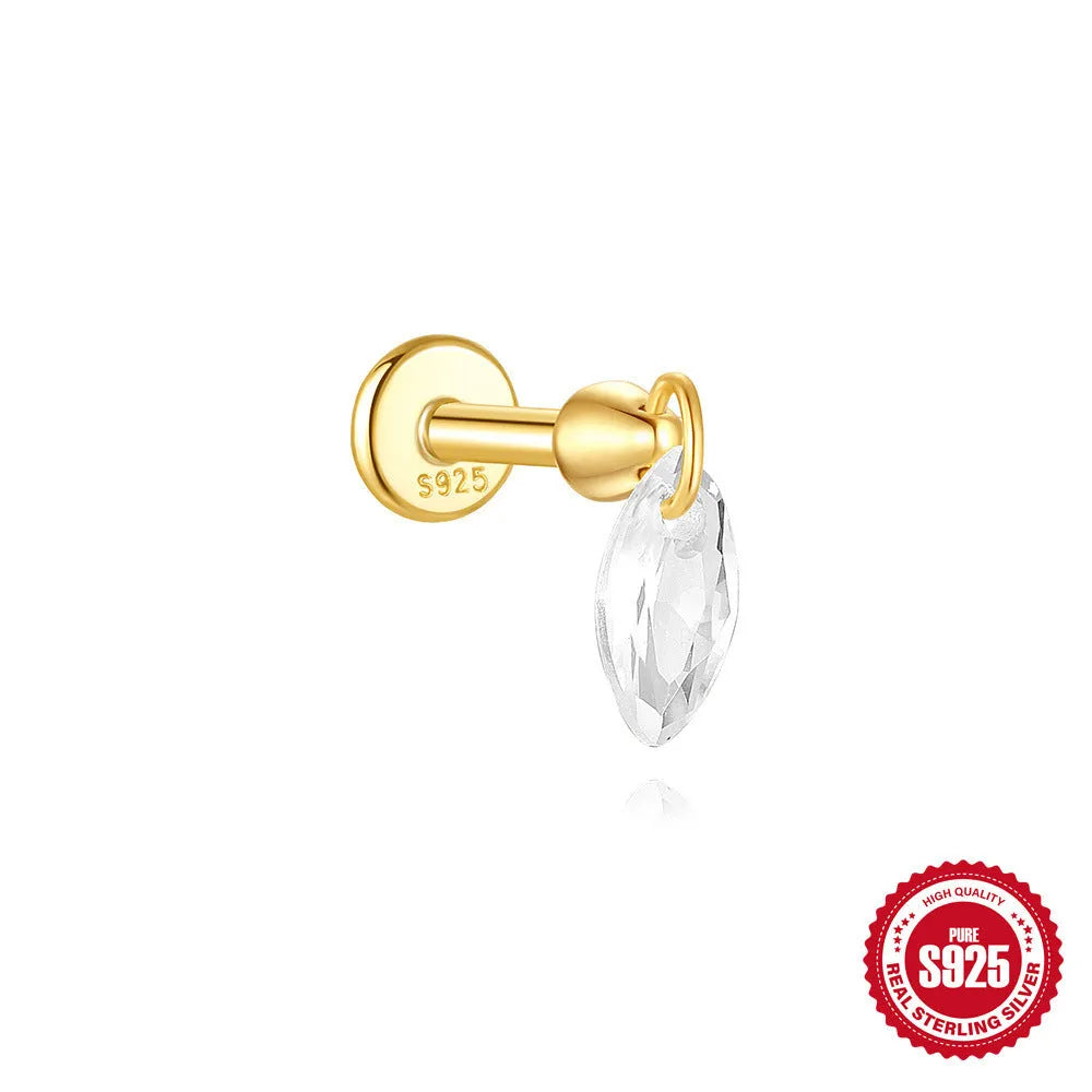 Geometric kite-shaped sterling silver earring with rhinestone head and gold chain tassel.