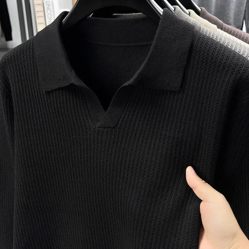 Men's loose fit plain pullover sweater in green, shown on a model for scale.