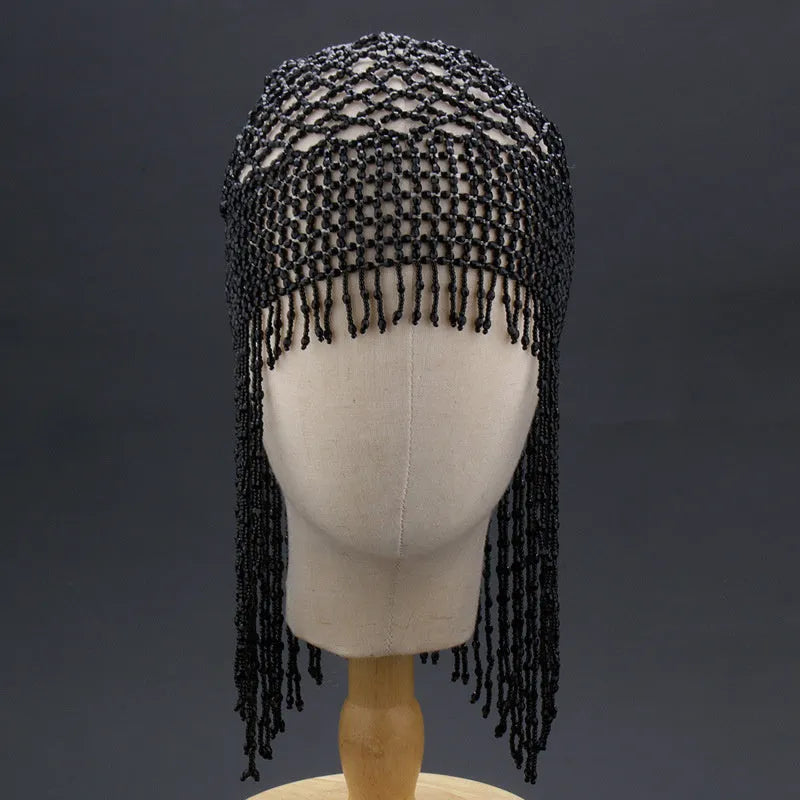 Handmade beaded belly dance headwear with alloy mesh and long tassel in silver.