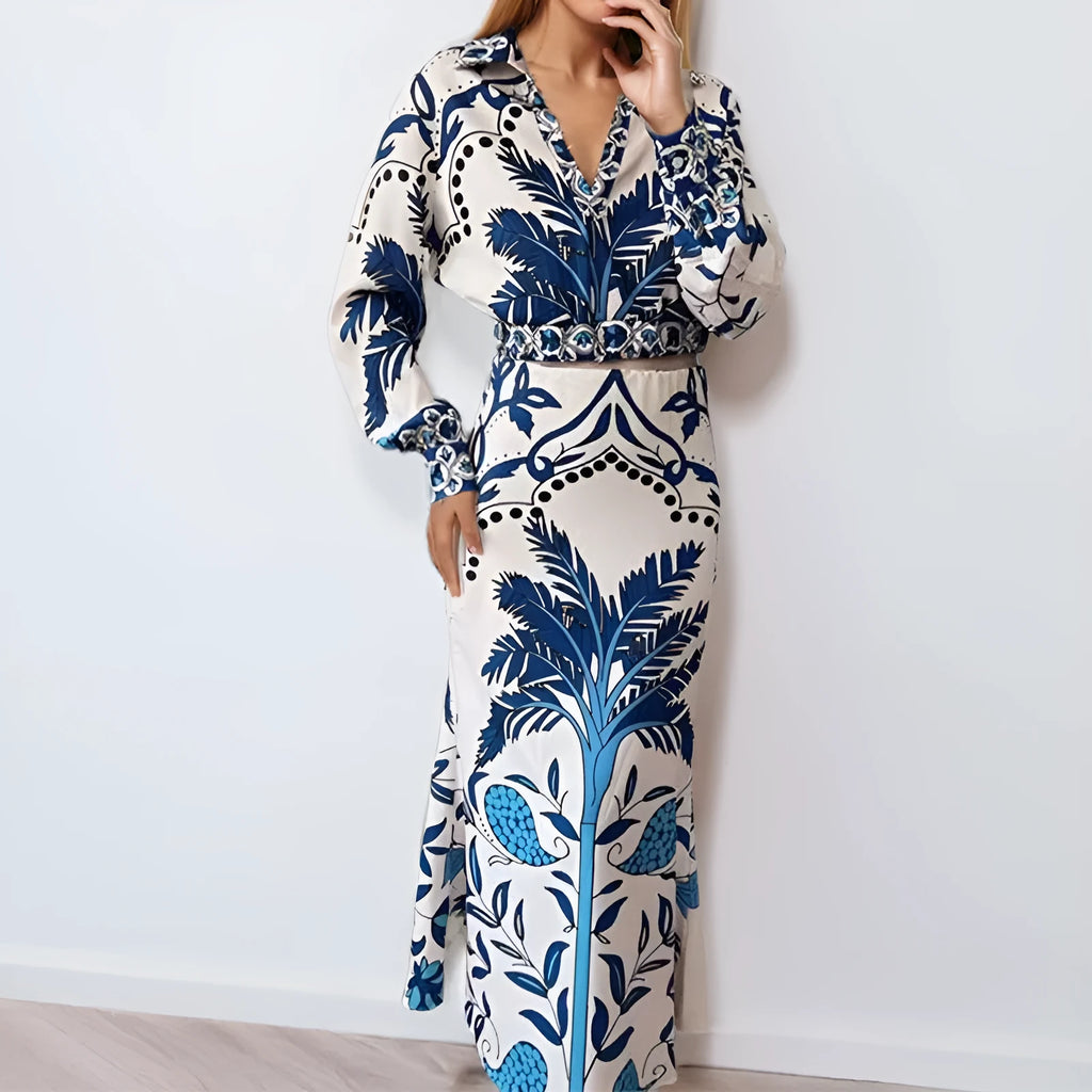 Women's floral print casual set with long sleeve top and long matching skirt.