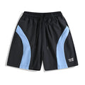 Loose-fit black sports shorts with elastic waistband and straight-leg design for training.