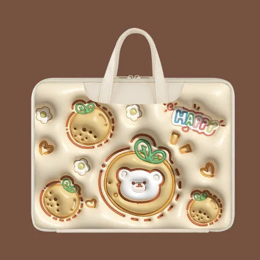 PU leather inflatable laptop bag with cartoon design, shown hanging from a suitcase handle.
