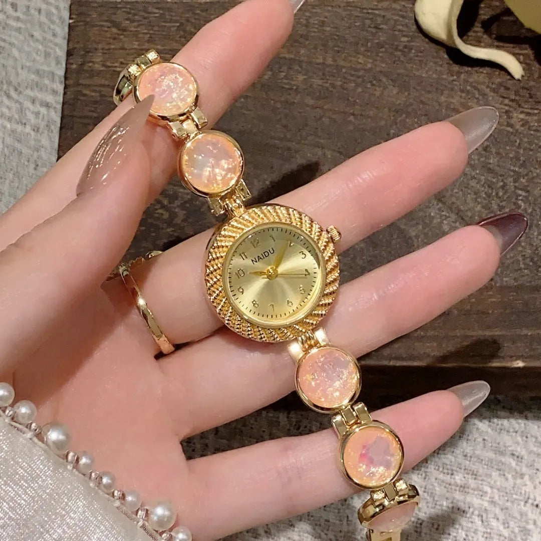 Women's quartz watch with 25mm round dial and zinc alloy case in a choice of six colours.