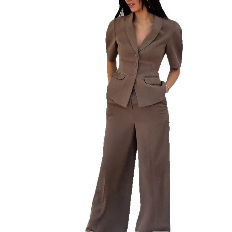 Brown men's slim fit polyester suit with long sleeve top and trousers on a hanger.