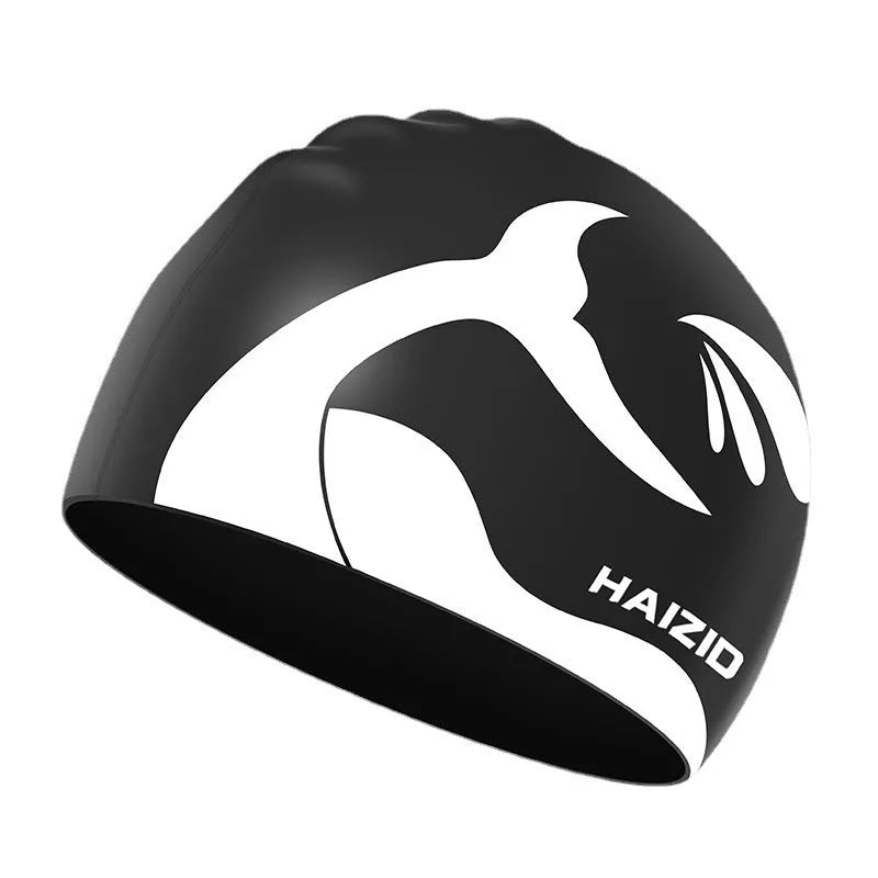 Silicone swim cap with waterproof ear protectors featuring whale tail design in multiple colours