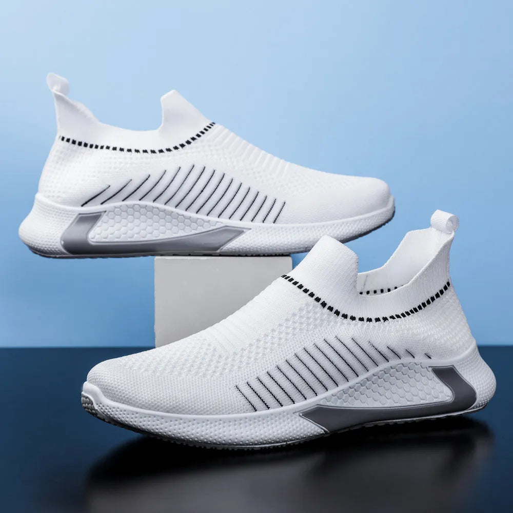 Men's black and white mesh sock sneakers with a striped design and lace-up front.