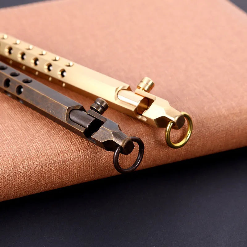 Brass hexagonal bolt pen showing six-sided barrel and bolt detailing with 0.5mm rollerball tip