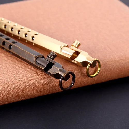 Brass hexagonal bolt pen showing six-sided barrel and bolt detailing with 0.5mm rollerball tip