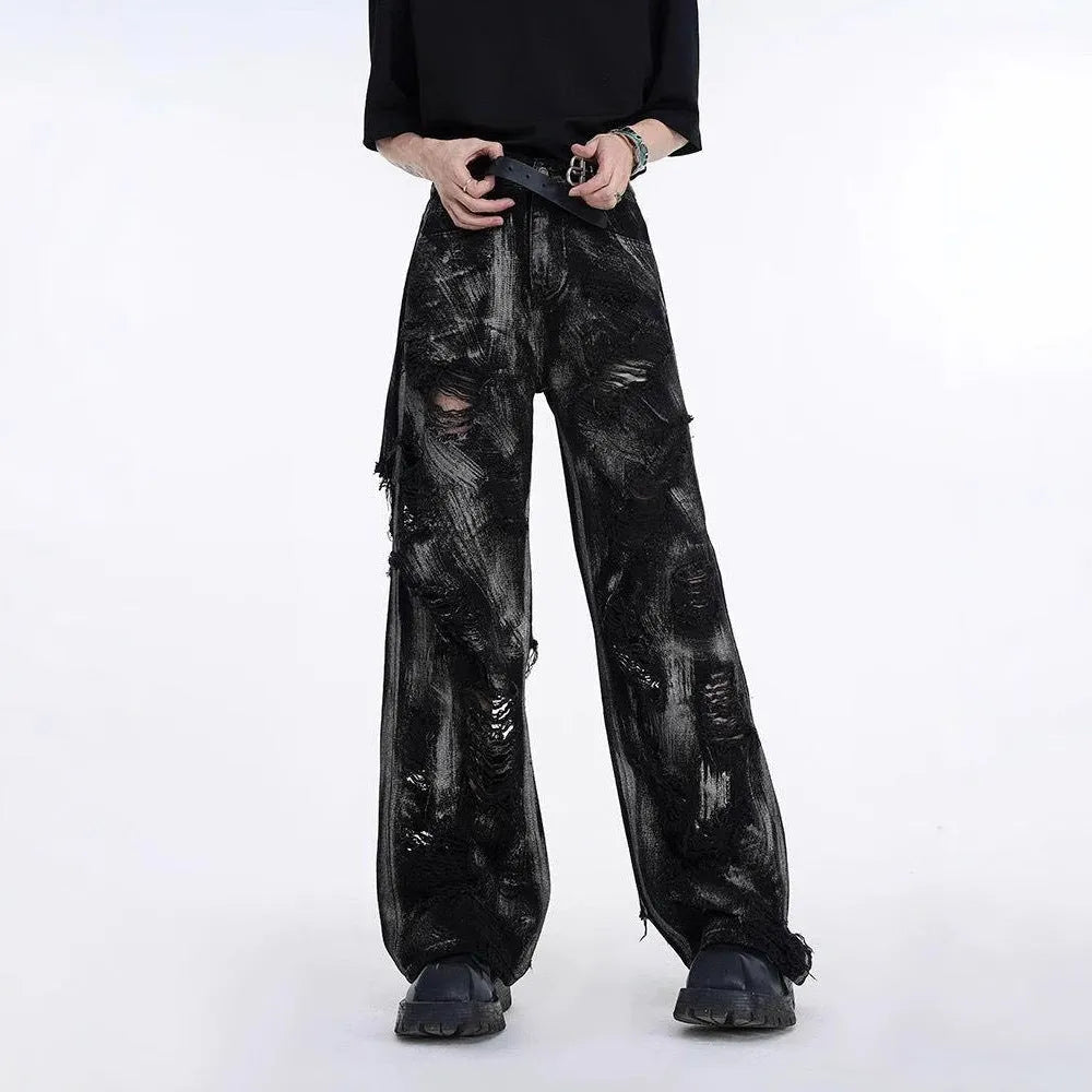 Men's black and grey pink graffiti-style heavyweight washed denim jeans on a mid-waist fit.