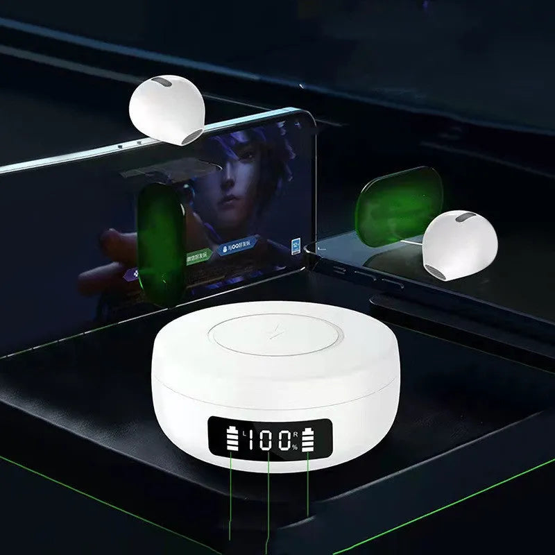 Mini black semi-in-ear wireless headphones sitting inside their white wireless charging case.