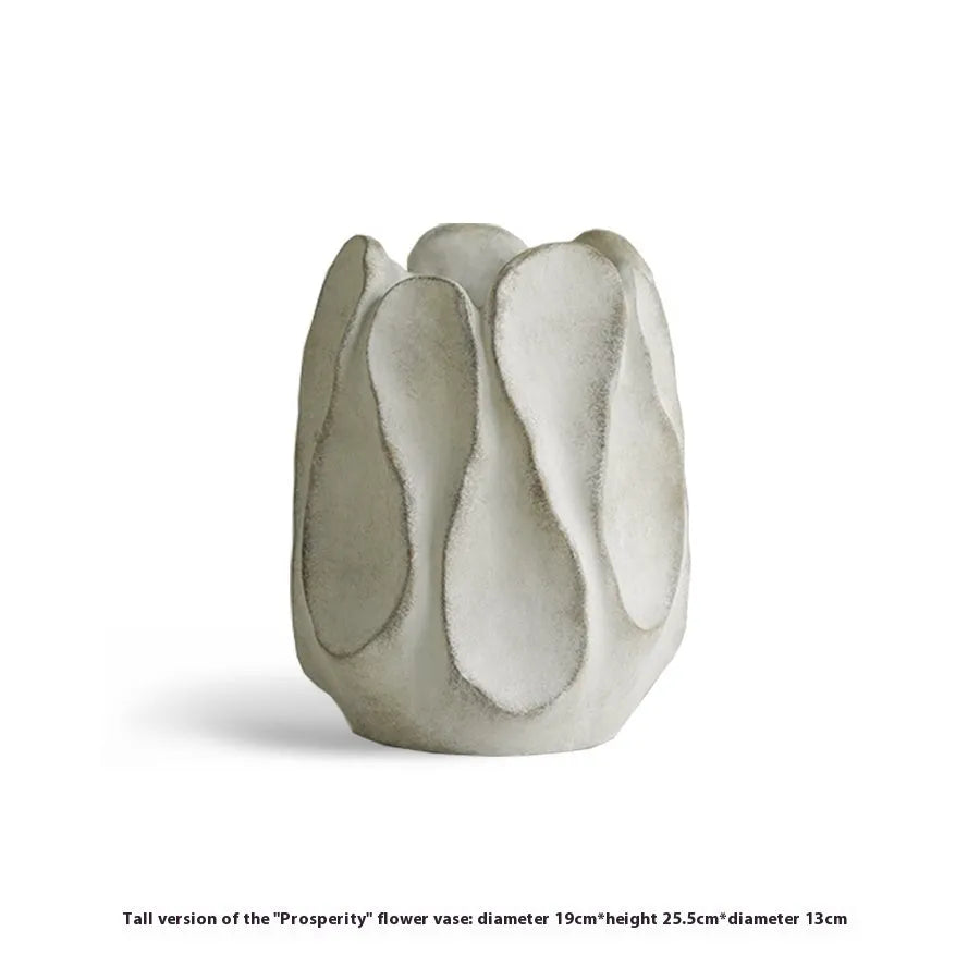 Irregular ceramic vase for flower arrangements in high style or low style profile