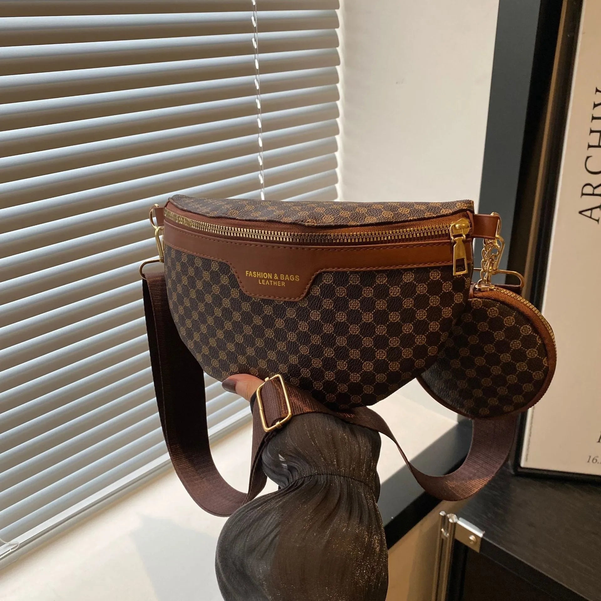 Retro printed portable PU crossbody bag in coffee colour with sewing thread detailing and sandwich pocket