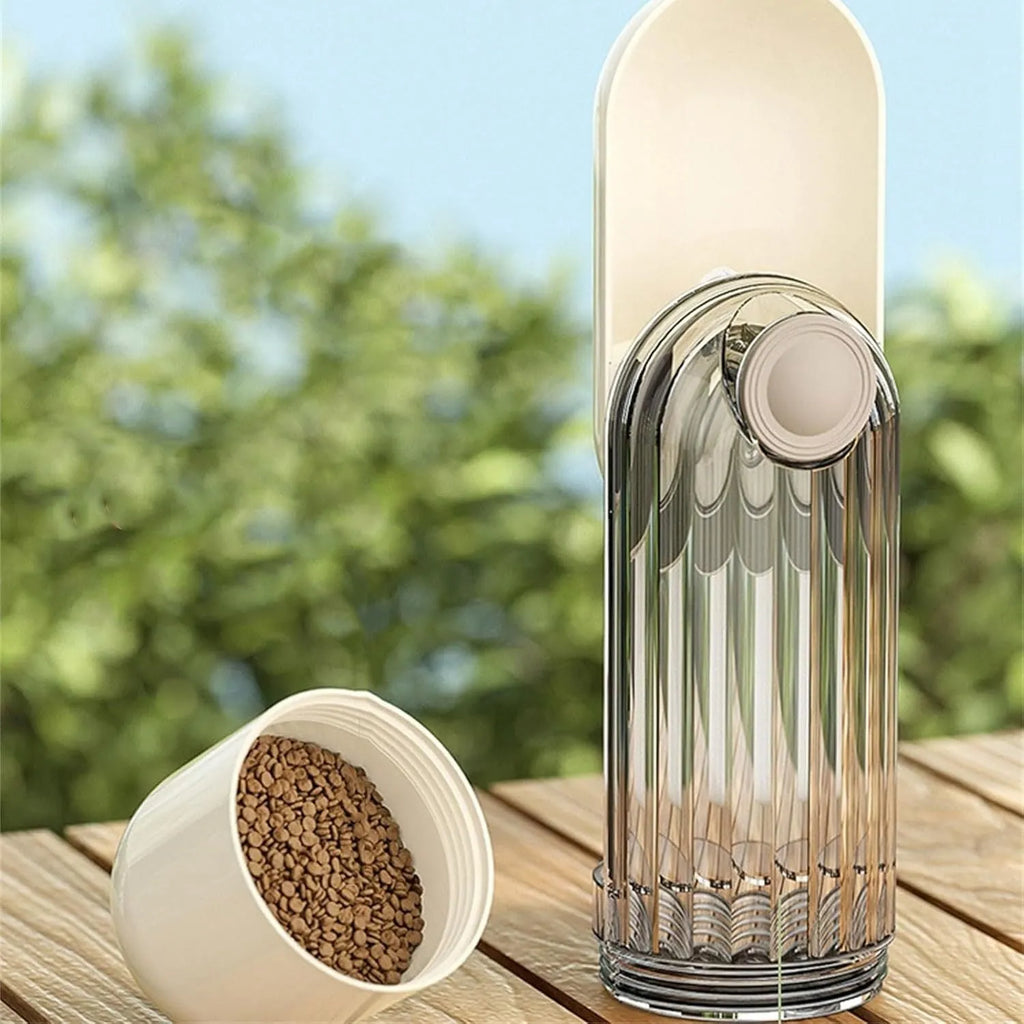 Beige foldable dog water bottle with food container, showing dispenser tray and compact size.