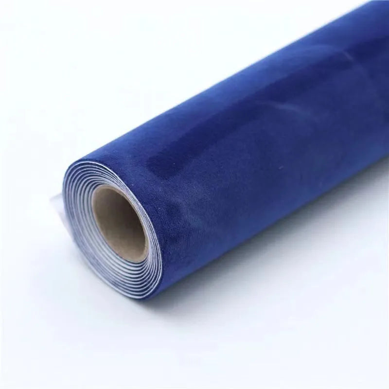 Self-adhesive leather suede sheet roll in multiple colour swatches showing black, brown, blue, and red.