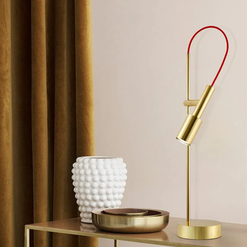 Simple modern rotating table lamp in sand black finish with wrought iron base and G9 bulb, suitable for bedside use