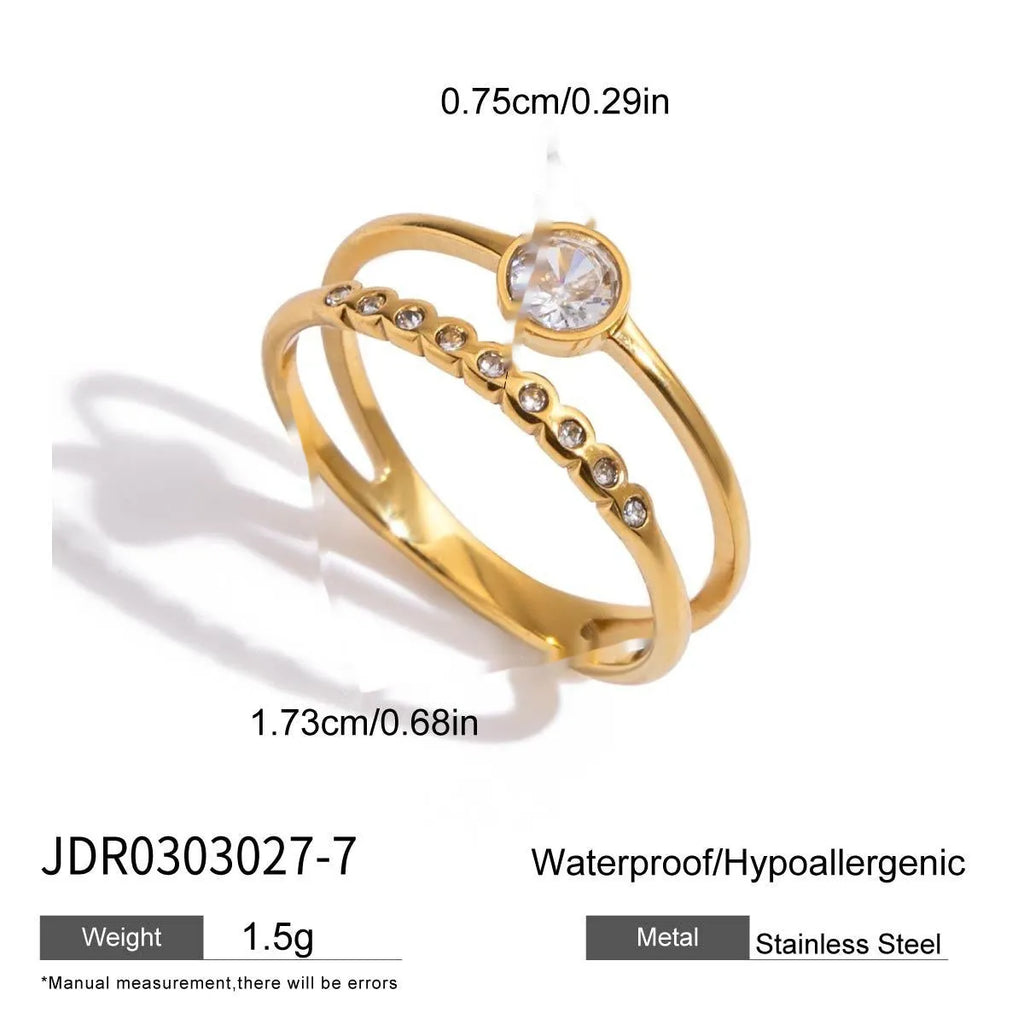 Geometric stainless steel zircon ring with no-fade finish on a hand.