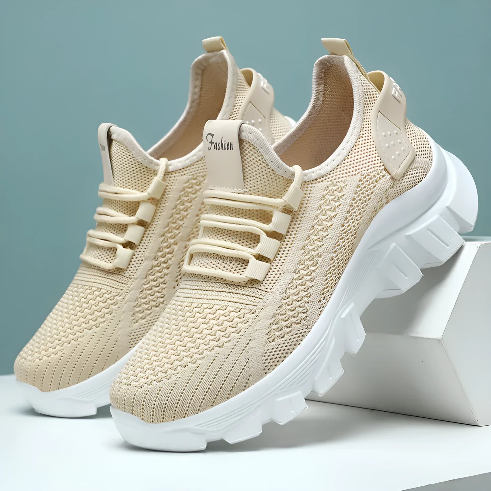 Women's white Flyknit running sneakers with thick PVC sole and lace-up front