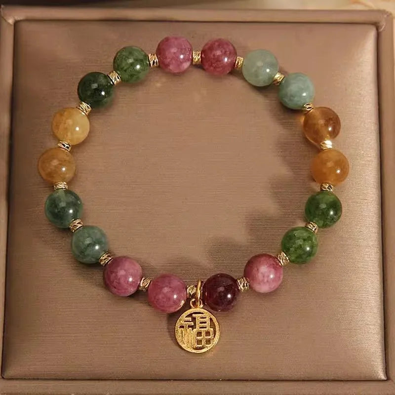 Natural colour tourmaline bracelet showing floral design option with electroplated silver finish