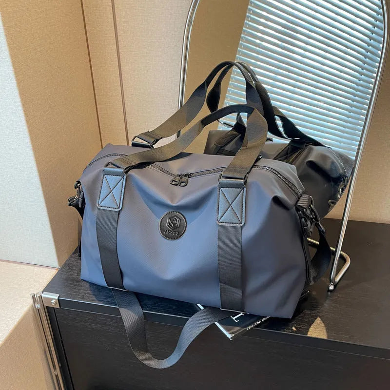 Waterproof Oxford cloth travel bag in solid colour with 36-55 litre capacity for short-distance trips