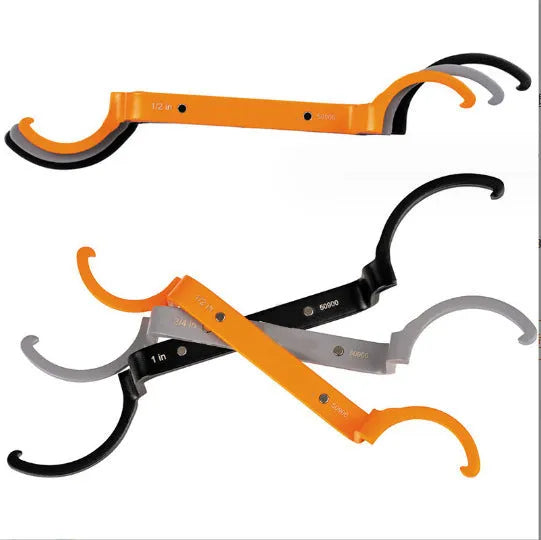 Crescent magnetic suction wrench set showing orange, grey, and black tools with catheter locking mechanism