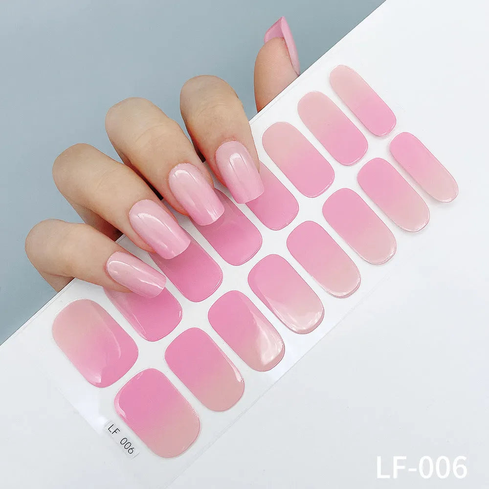 Full nail art sticker sheet showing 16 different solid colour designs including European simple nails and floral patterns