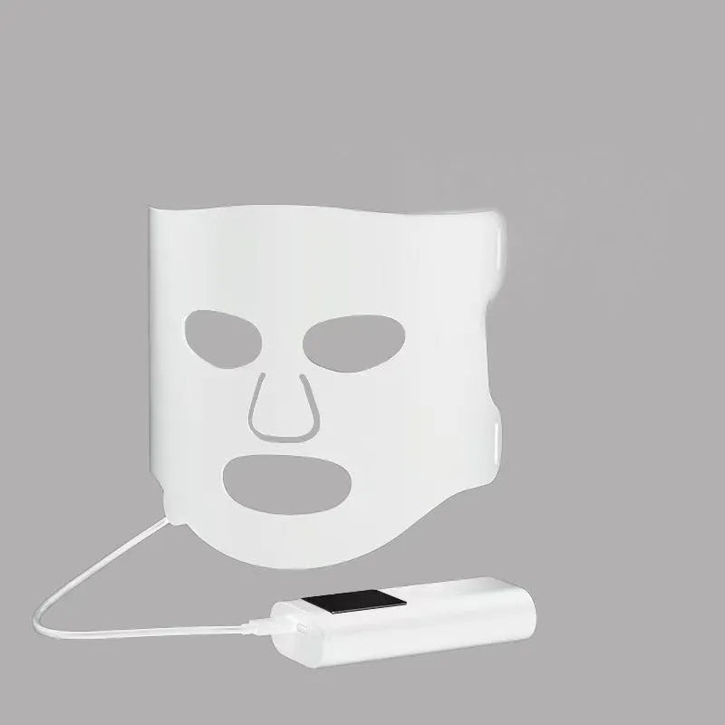 Black and gold LED phototherapy face mask with seven colour light modes for home skincare treatment.